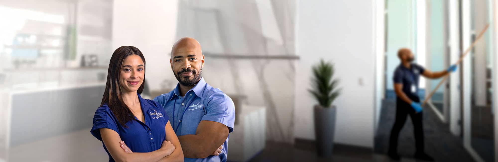 a man and woman standing in an office