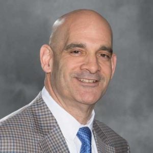 a man in a suit and tie