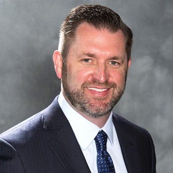 a man in a suit and tie