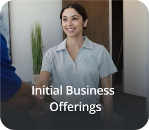 a woman in a blue shirt is talking to a man