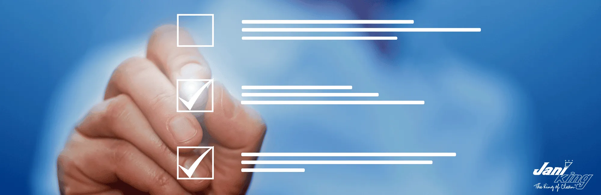 A hand checking off items from an office cleaning checklist.